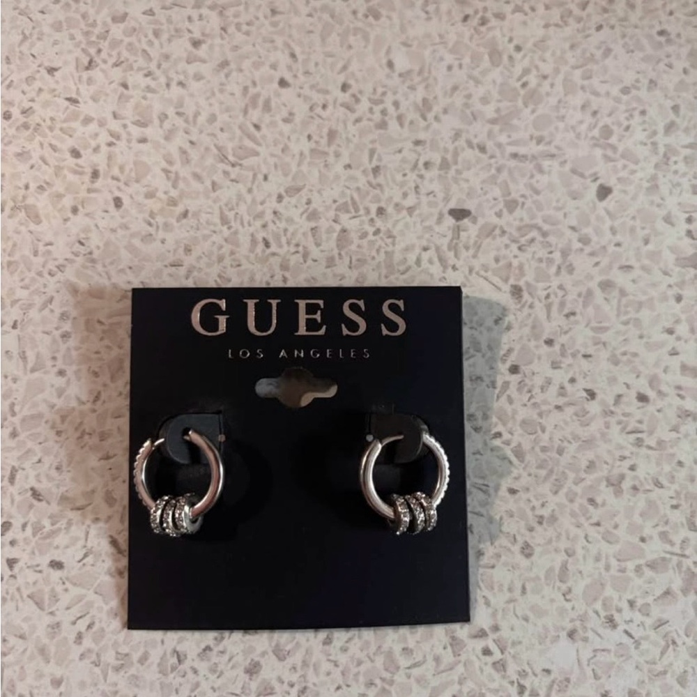 Guess silver color earring
